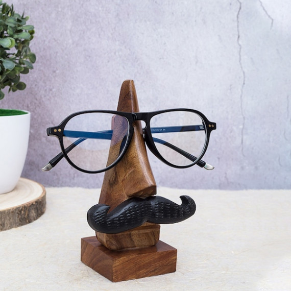 https://www.trendingfits.com/products/brown-handcrafted-eyeglass-holder-showpiece