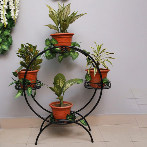 https://www.trendingfits.com/products/set-of-4-black-solid-metal-planters-with-round-shaped-stand