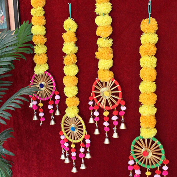 https://www.trendingfits.com/products/set-of-4-artificial-marigold-flowers-hanging-garland-torans-with-bells