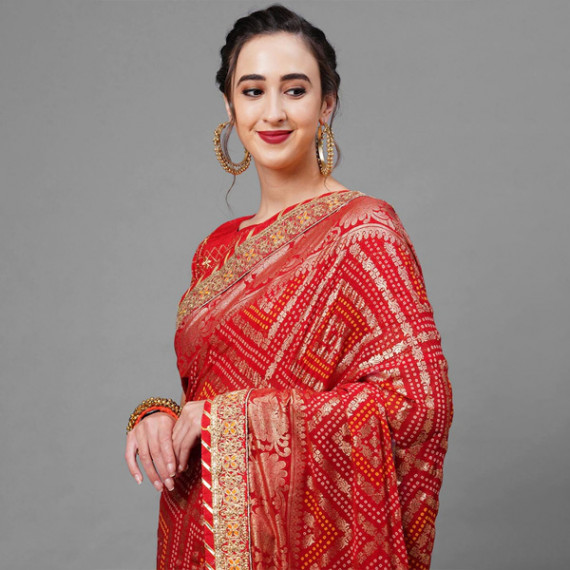 https://www.trendingfits.com/products/red-gold-toned-woven-design-bandhani-saree