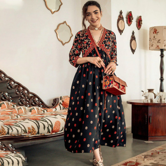 https://www.trendingfits.com/products/black-orange-ethnic-motifs-printed-maxi-dress