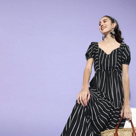 https://www.trendingfits.com/products/black-white-striped-crepe-maxi-dress