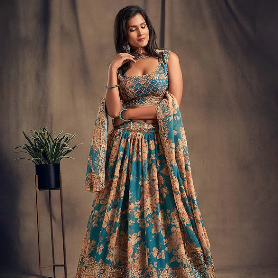 https://www.trendingfits.com/products/blue-beige-printed-semi-stitched-lehenga-unstitched-blouse-with-dupatta